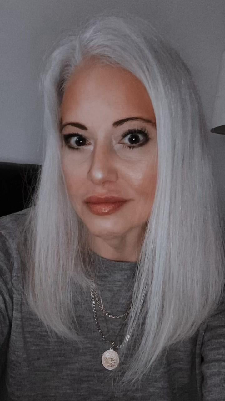 Sleek Mid-Back Silver Grey — Hair Color 2027 for Women Over 60