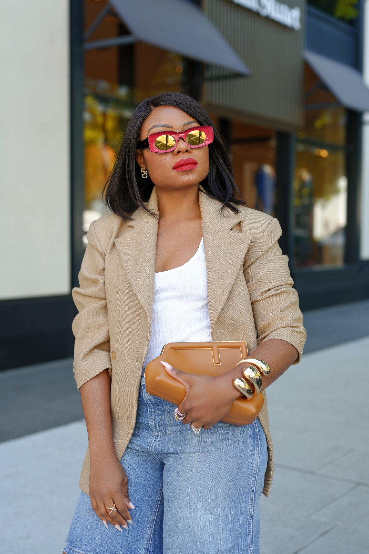 Light Wash Jorts with Beige Blazer and Pink Sunglasses Light Wash Jorts with Beige Blazer and Pink Sunglasses — Jorts Outfits 2027