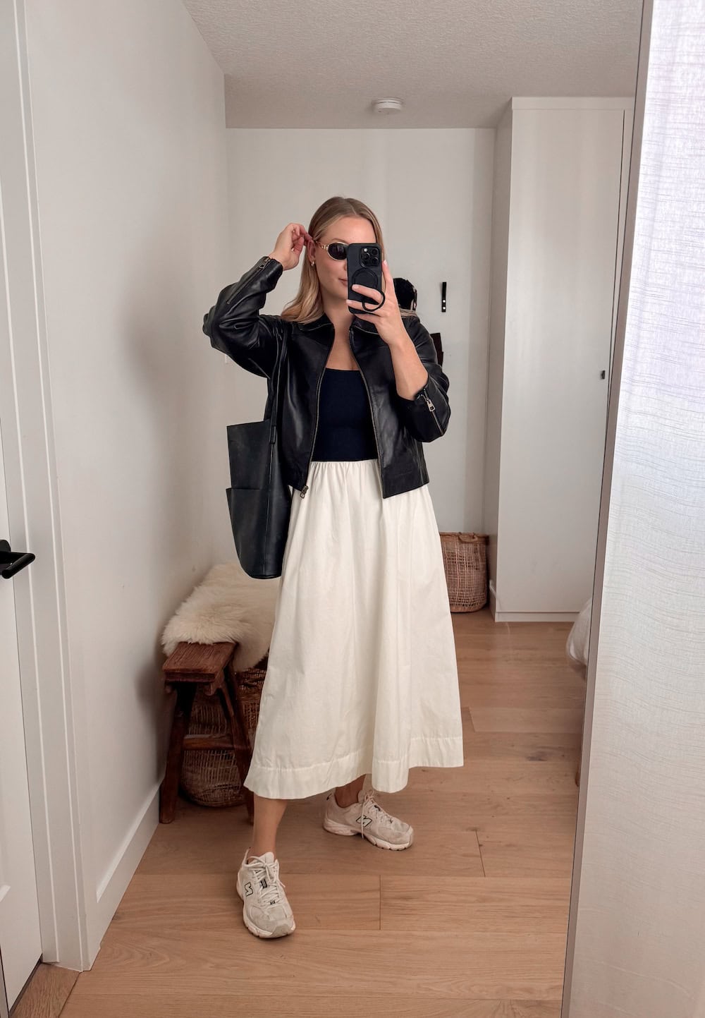 Leather Jacket Over Black Tank with Beige Sneakers and Wide Skirt Leather Jacket Over Black Tank with Beige Sneakers and Wide Skirt — Retro Sneakers Outfits 2027