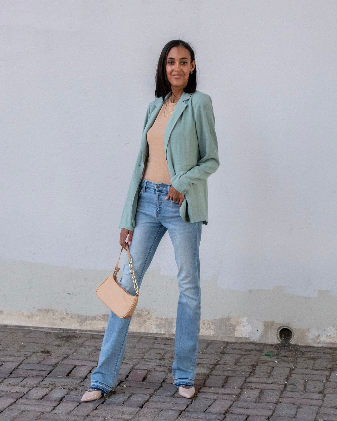 Light Wash Bootcut Jeans with Mint Green Blazer and Nude Flats Light Wash Bootcut Jeans with Mint Green Blazer and Nude Flats — Bootcut Jeans Outfits 2027 with Tank Top