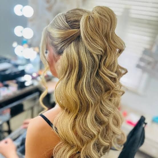 Mid-Back High Voluminous Ponytail Blonde Curls Mid-Back High Voluminous Ponytail Blonde Curls — Half Up Half Down Hairstyles 2027 with Weave
