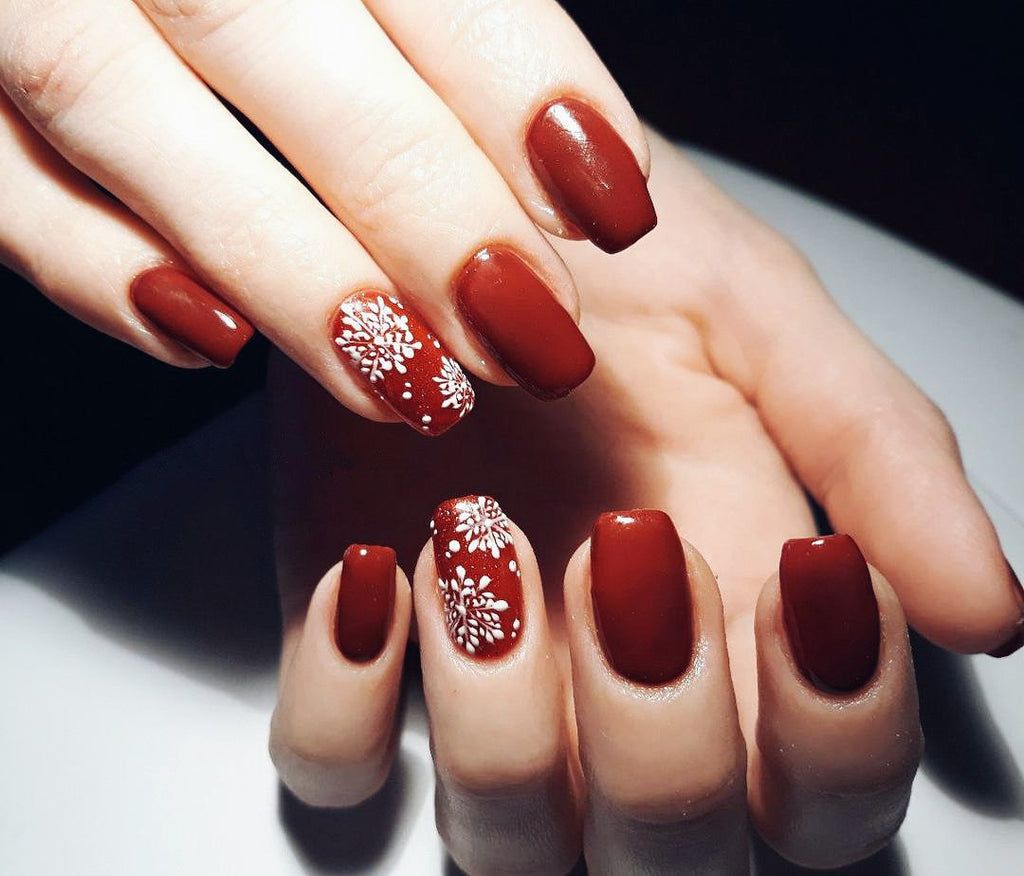 White Snowflake Art On Accent Nails Visual Idea White Snowflake Art On Accent Nails Visual Idea — Christmas Acrylic Nails 2026
