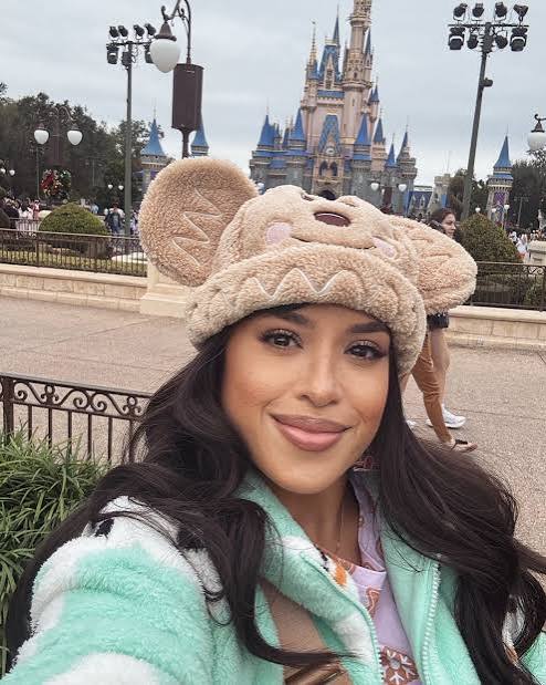 Fuzzy Bear Ears and Mint Green Jacket — Disney Winter Outfits 2027