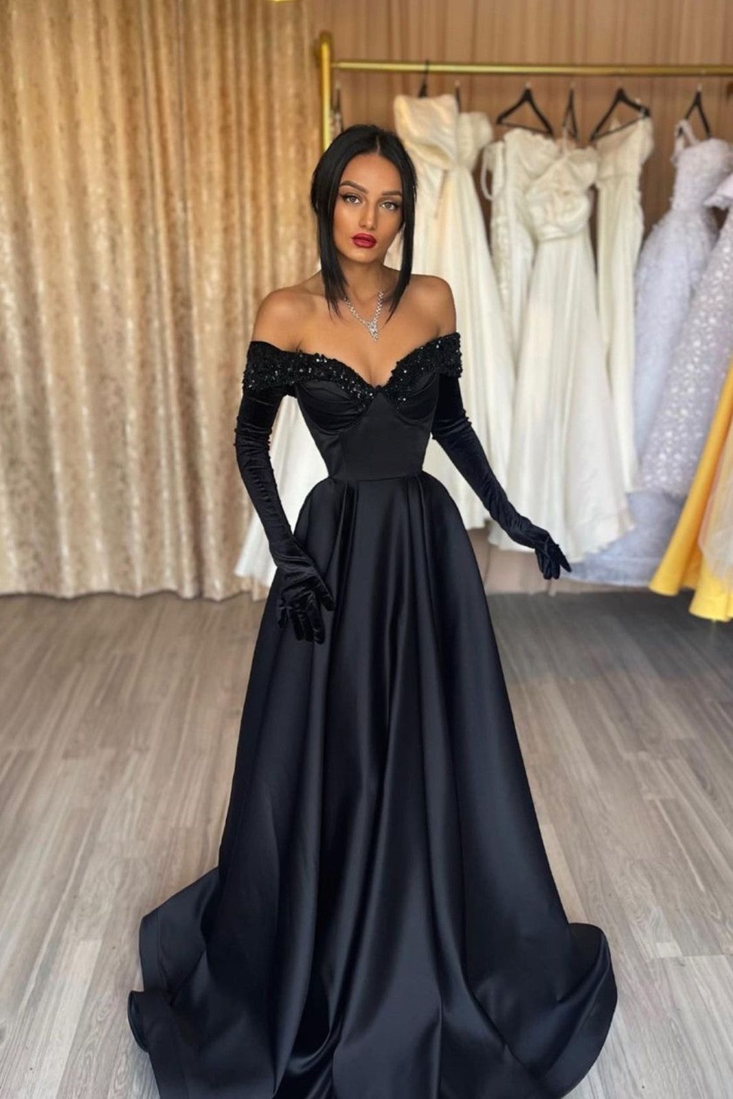 Classic Black Off-the-Shoulder Satin Prom Dress with Flowing Skirt and Gloves Classic Black Off-the-Shoulder Satin Prom Dress with Flowing Skirt and Gloves — Prom Dress 2027 with Gloves