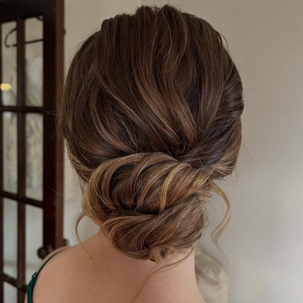 Voluminous Low Updo With Loose Curls Voluminous Low Updo With Loose Curls — Christmas Photo Hairstyles 2026