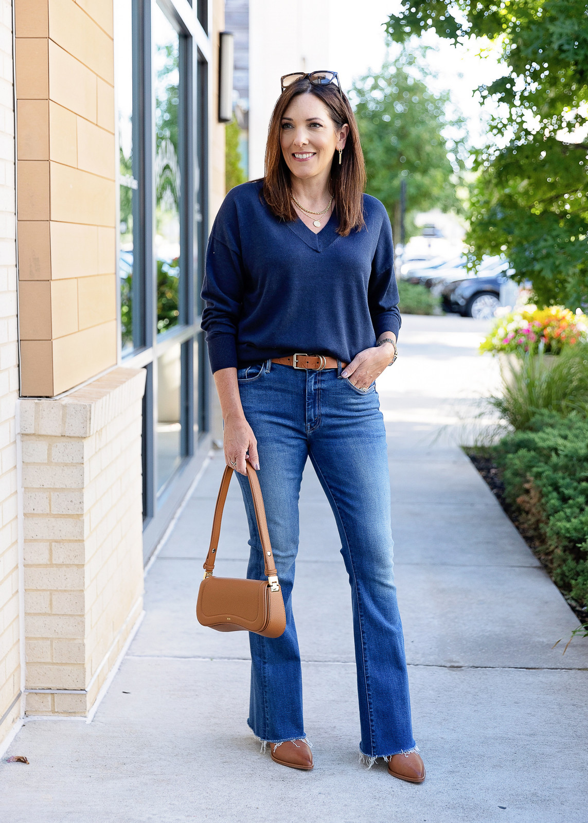 Flared Jeans with V-Neck Sweater and Boots Flared Jeans with V-Neck Sweater and Boots — Outfits 2027 for Mom Bod