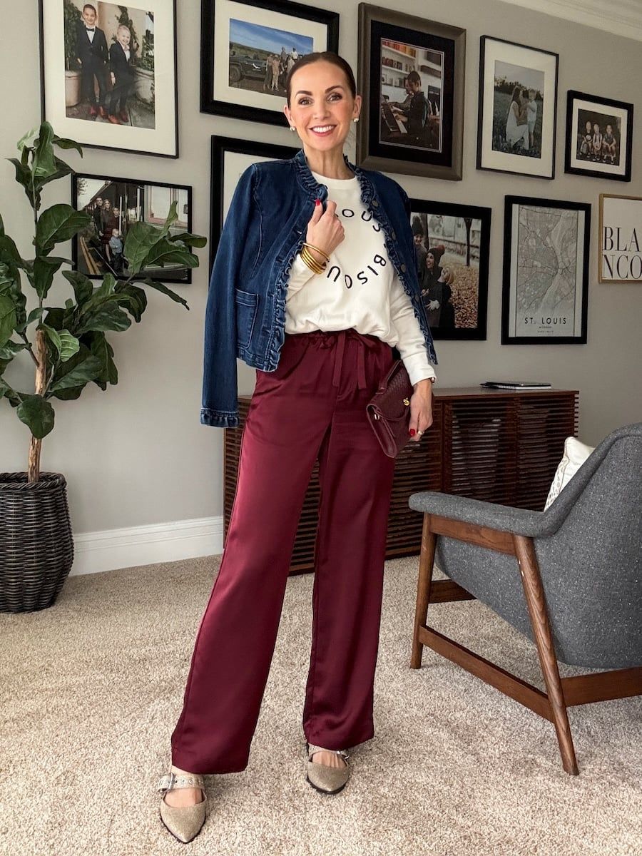 Burgundy Satin Pants Elevate a Casual Denim Look Burgundy Satin Pants Elevate a Casual Denim Look — Winter Outfits Warm Climate 2027