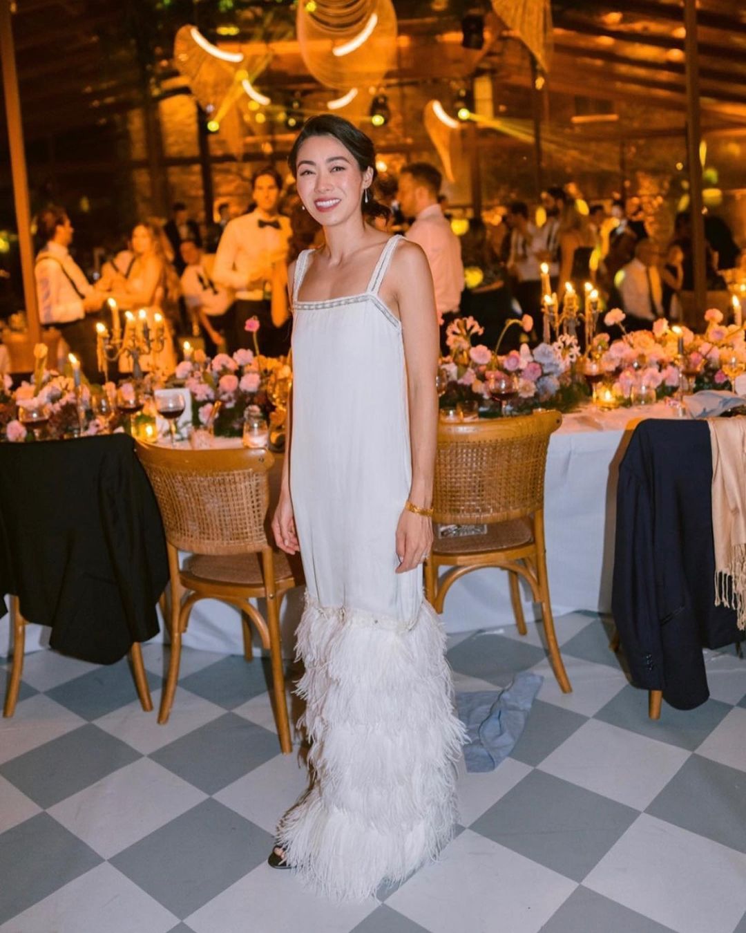 Whimsical Touch: White Midi Dress with Feathered Hem for a Party Whimsical Touch: White Midi Dress with Feathered Hem for a Party — Birthday Dresses 2027