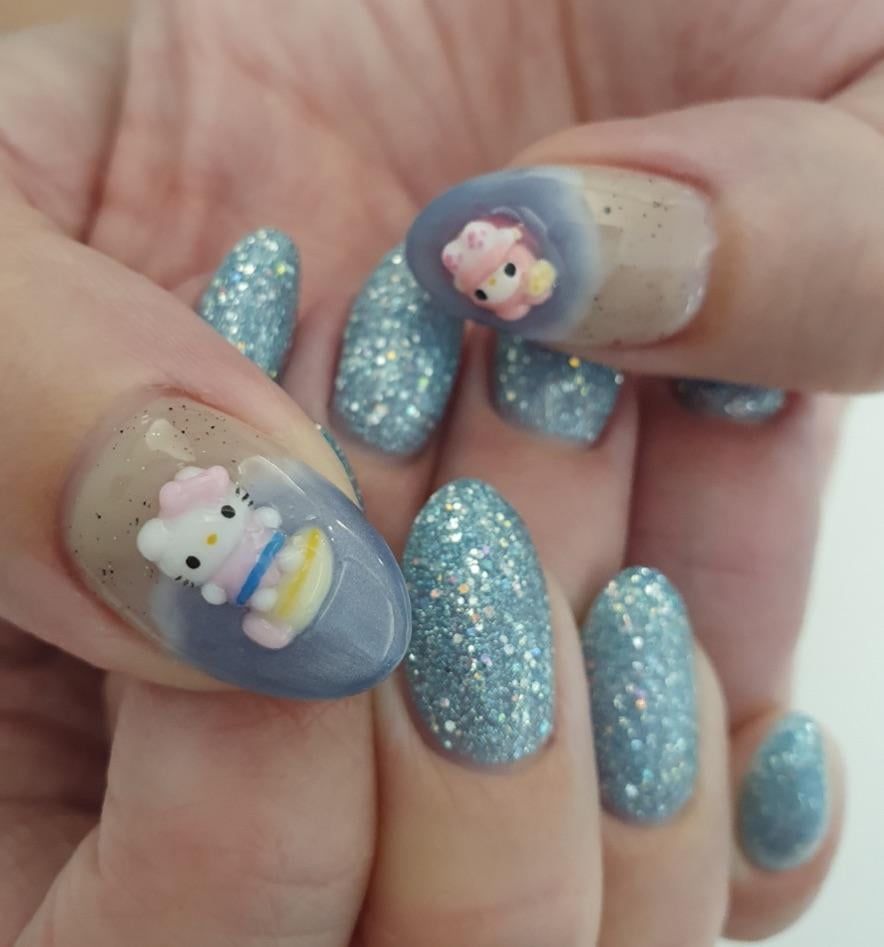 3D Hello Kitty Figures on Glitter Blue 3D Hello Kitty Figures on Glitter Blue — Hello Kitty Nails 2027 for Kids