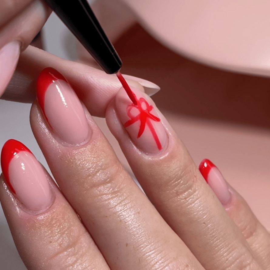 Red Bow Art On The Ring Finger Nail Visual Idea Red Bow Art On The Ring Finger Nail Visual Idea — Long Bow Nails 2027