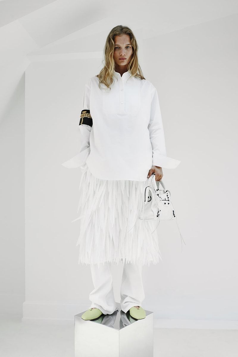 Chic White Ensemble Featuring a Striking Feather Fringe Skirt Chic White Ensemble Featuring a Striking Feather Fringe Skirt — Feather Outfits 2027