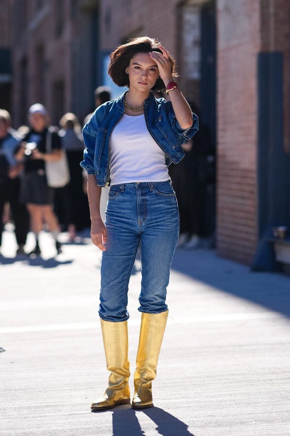 Cropped Blue Denim Jacket with High-Waisted Jeans and Gold Boots — Denim Jackets 2027