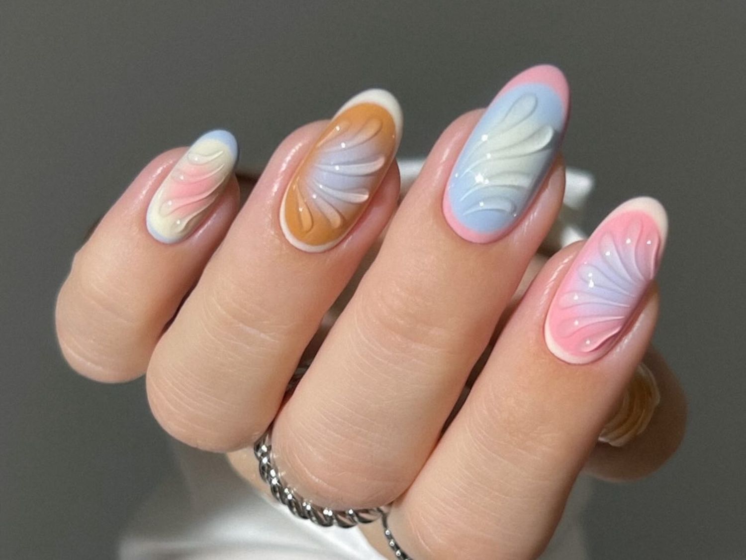 3D Sculpted Pastel Wave Nails 3D Sculpted Pastel Wave Nails — Summer Nail Trends 2027