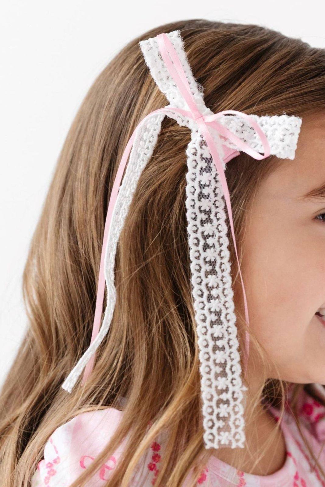 Side Part Lace Bow And Hanging Ribbons — Ribbons Little Girl Hairstyles 2027
