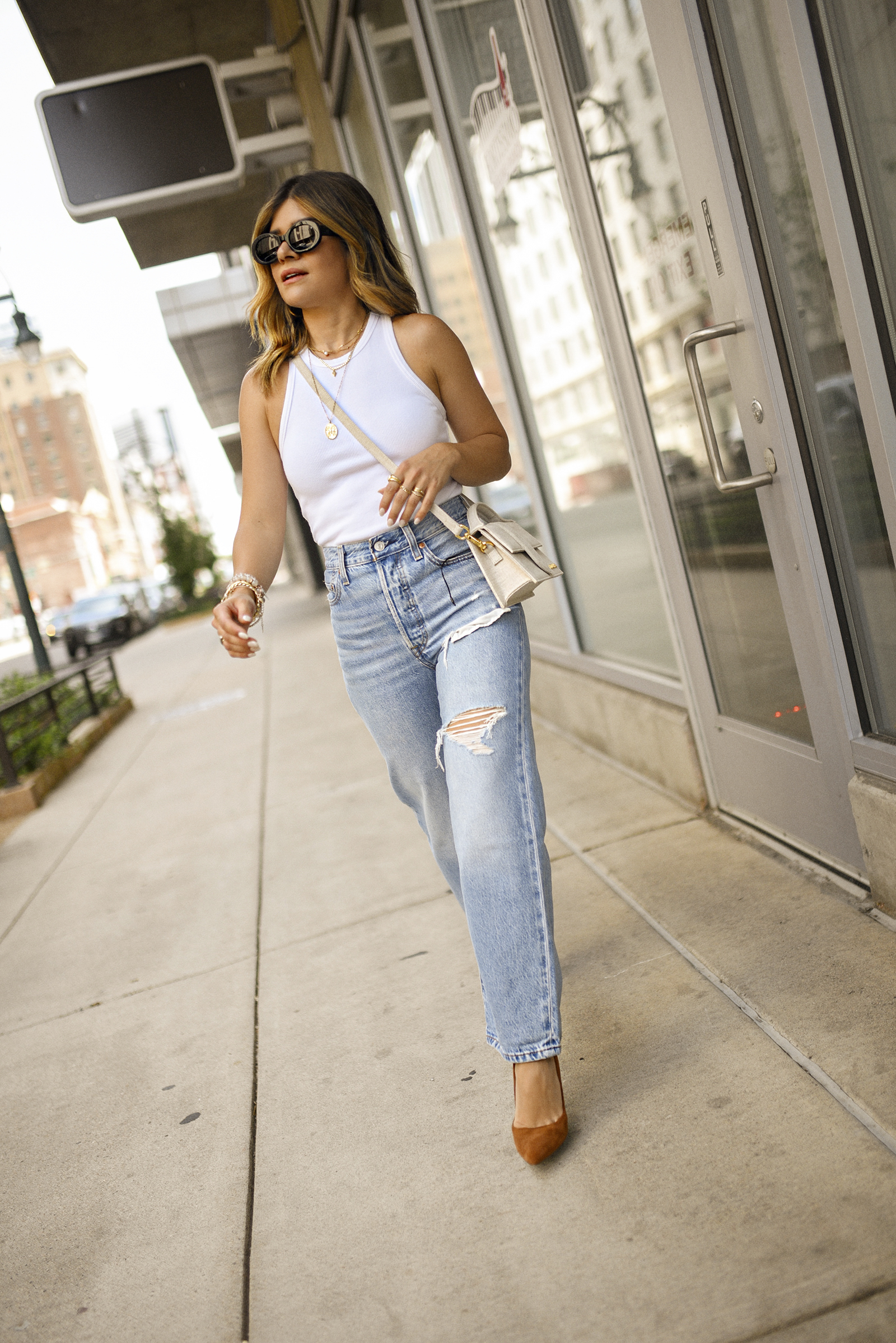 Edgy Details: Ripped Jeans with a White Tank Edgy Details: Ripped Jeans with a White Tank — Straight Leg Jeans Outfits 2027