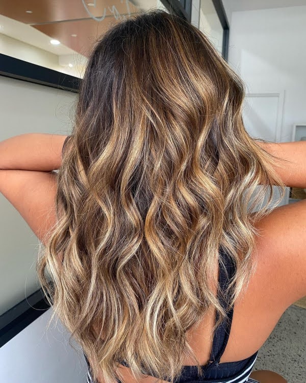 Collarbone Warm Brown Sun-Kissed Balayage Collarbone Warm Brown Sun-Kissed Balayage — Hair Color 2027 for Curly Hair