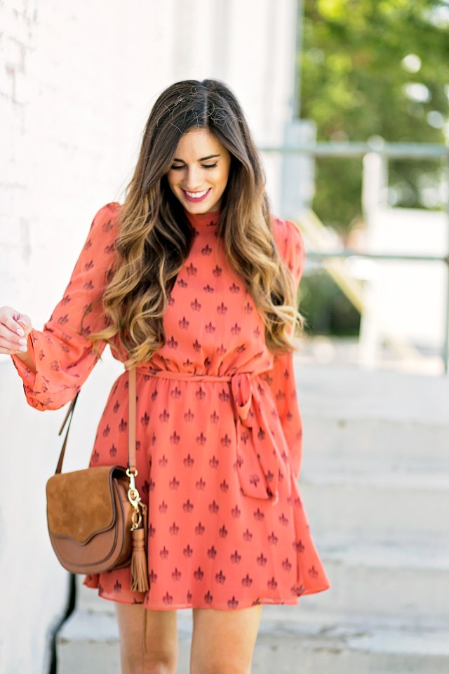 Printed Perfection: Coral Dress with Suede Bag — College Game Day Outfits 2026