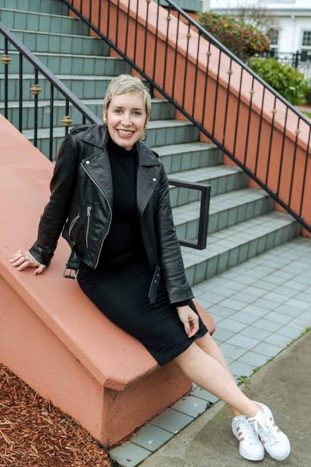 Black Turtleneck Bodycon Dress with Leather Jacket and Sneakers — Bodycon Dress Outfits 2027