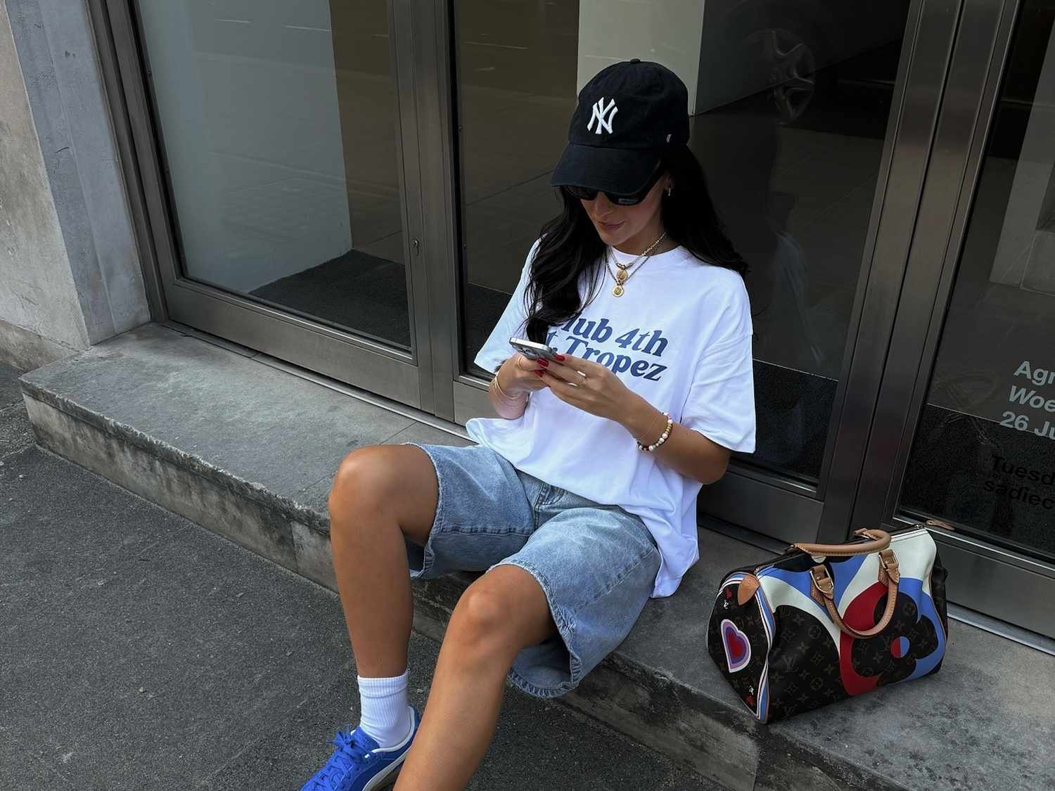 Loose Denim Shorts with Graphic Tee and Blue Sneakers Loose Denim Shorts with Graphic Tee and Blue Sneakers — Jorts Outfits 2027