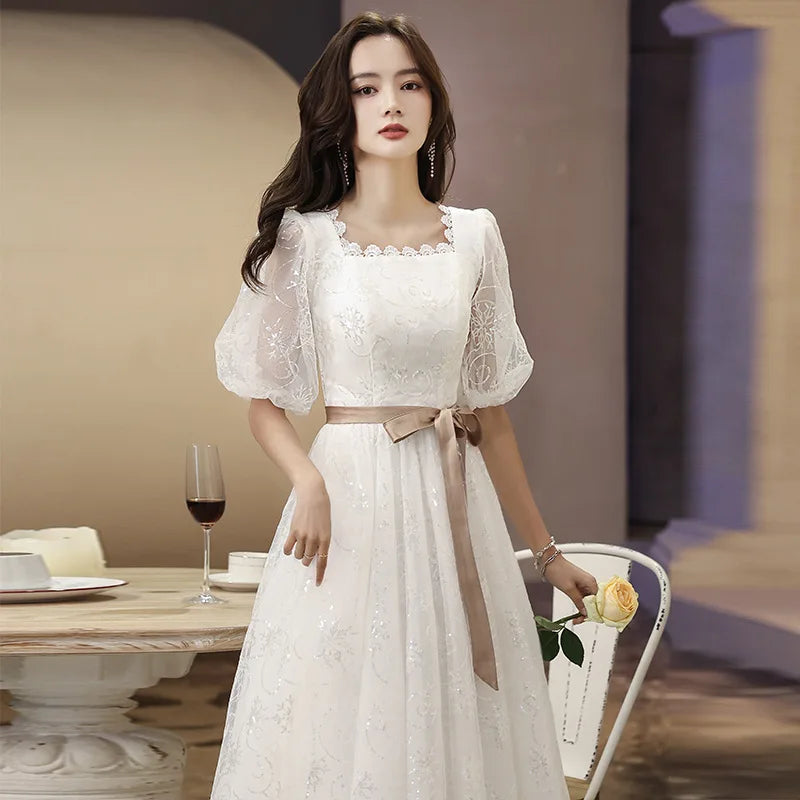 White Lace Midi Dress with Sheer Puff Sleeves and Sash White Lace Midi Dress with Sheer Puff Sleeves and Sash — Bows and Lace Outfits 2027
