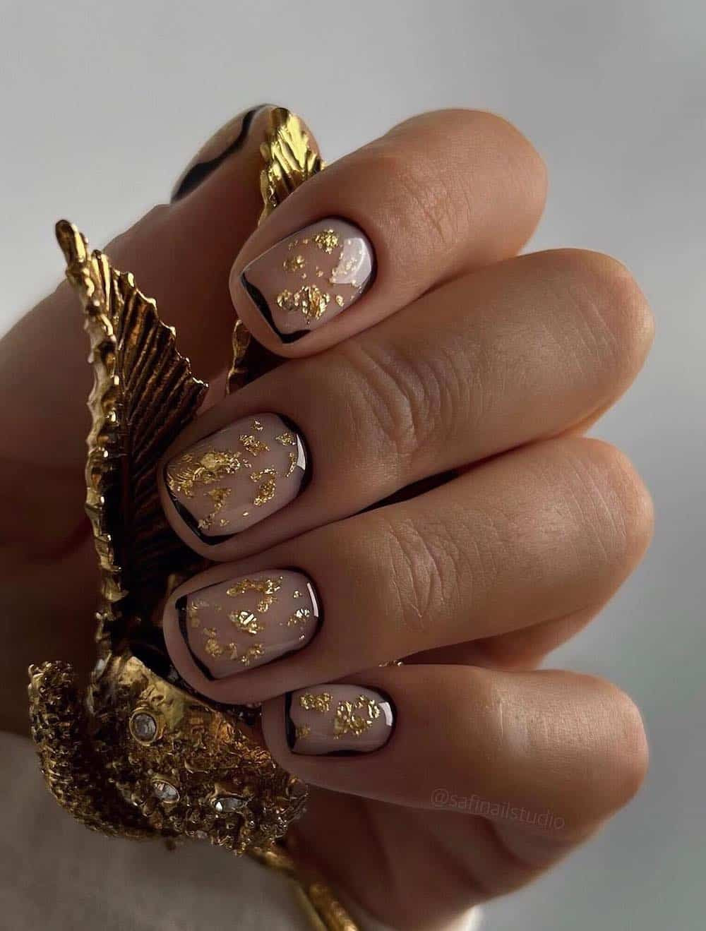 Nude with Gold Foil and Black Outline Nude with Gold Foil and Black Outline — Short New Years Nails 2027