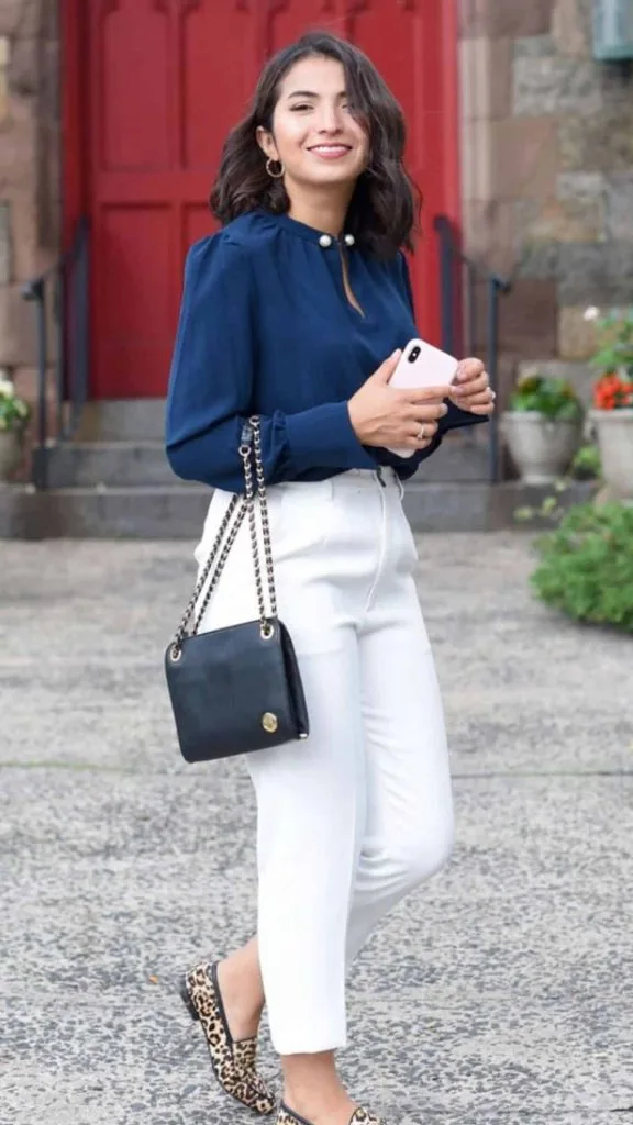 Navy High-Neck Blouse and White Trousers with Leopard Accents — First Day of Work Outfits 2027