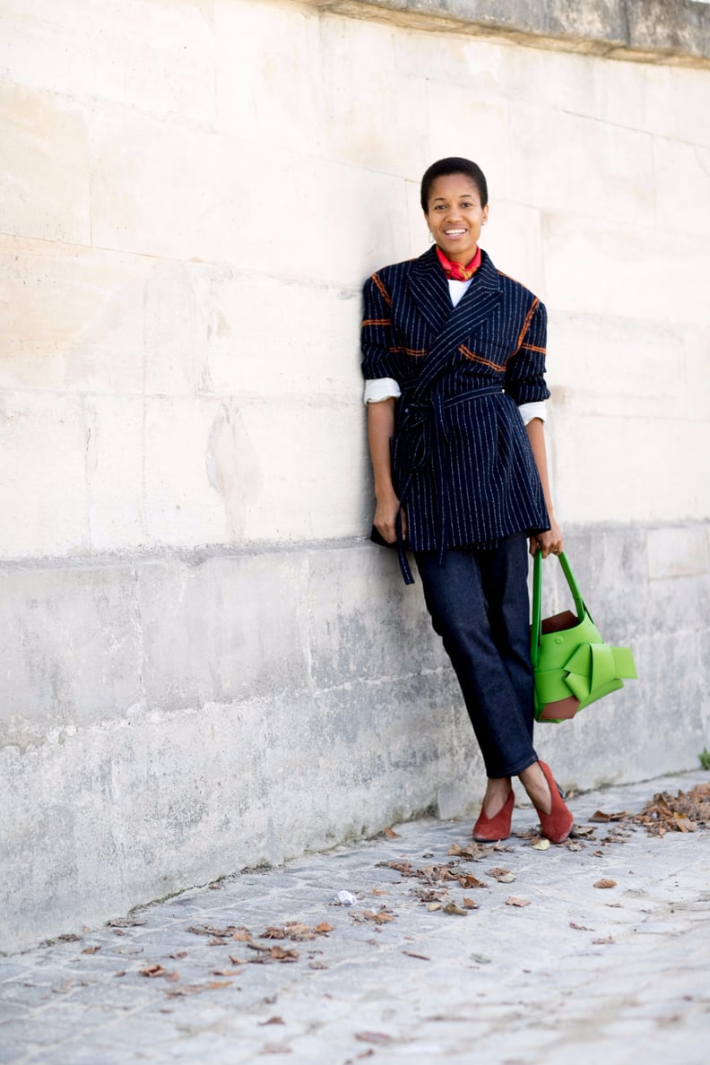 Buttoned Vest Layered Over a T-Shirt with A-Line Skirt — Office Outfits for Women 2027