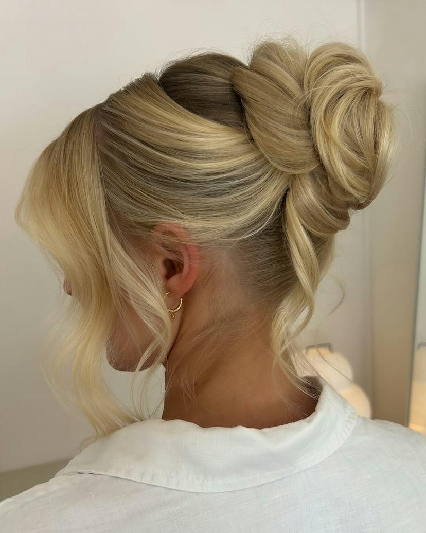 Sophisticated Twisted Updo With Bangs Sophisticated Twisted Updo With Bangs — Holiday Hairstyles 2026