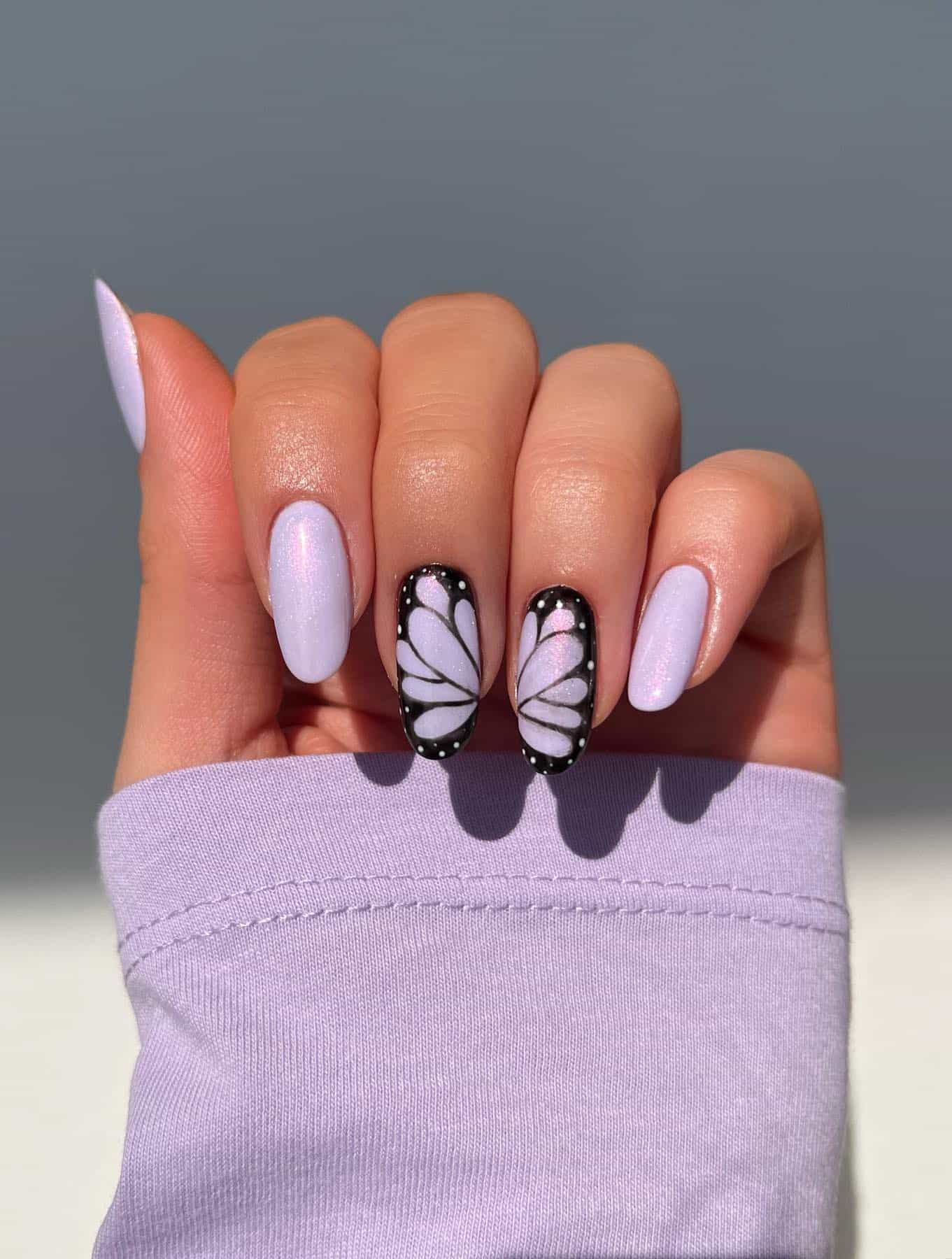 Pale Pink Subtle Butterfly Outline Almonds — Short Butterfly Almond Nails 2027