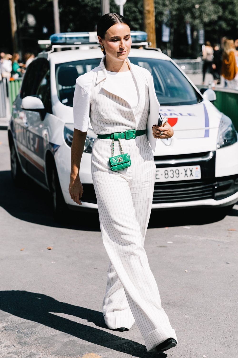 Pinstripe Jumpsuit with Bright Green Belt and Mini Bag Pinstripe Jumpsuit with Bright Green Belt and Mini Bag — Statement Belt Outfits 2027