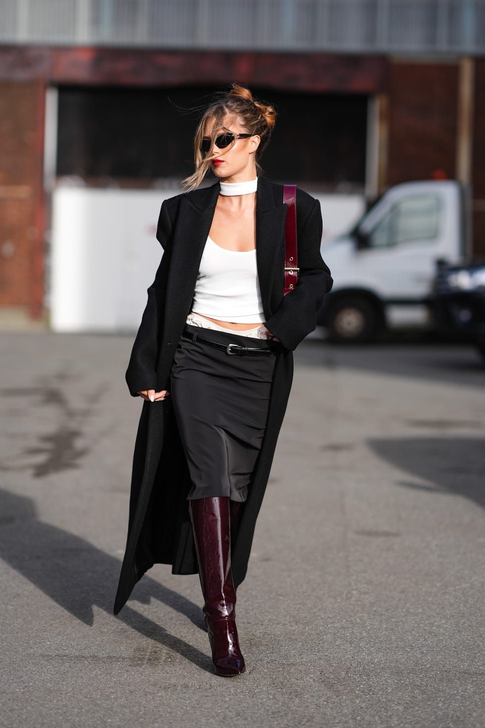Oversized Black Coat with Satin Skirt and Knee-High Boots Oversized Black Coat with Satin Skirt and Knee-High Boots — Winter Outfits Warm Climate 2027