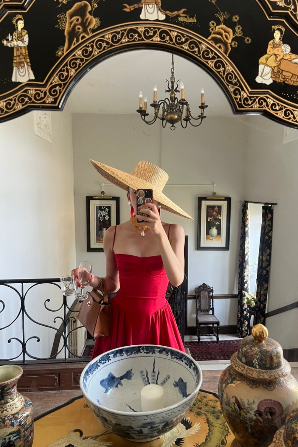 Red Fit-and-Flare Dress with Oversized Straw Hat — Summer Wedding Outfits 2027