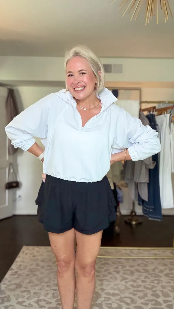 Athleisure Chic: Cropped Pullover with Ruffled Shorts Athleisure Chic: Cropped Pullover with Ruffled Shorts — Mom Outfits 2027