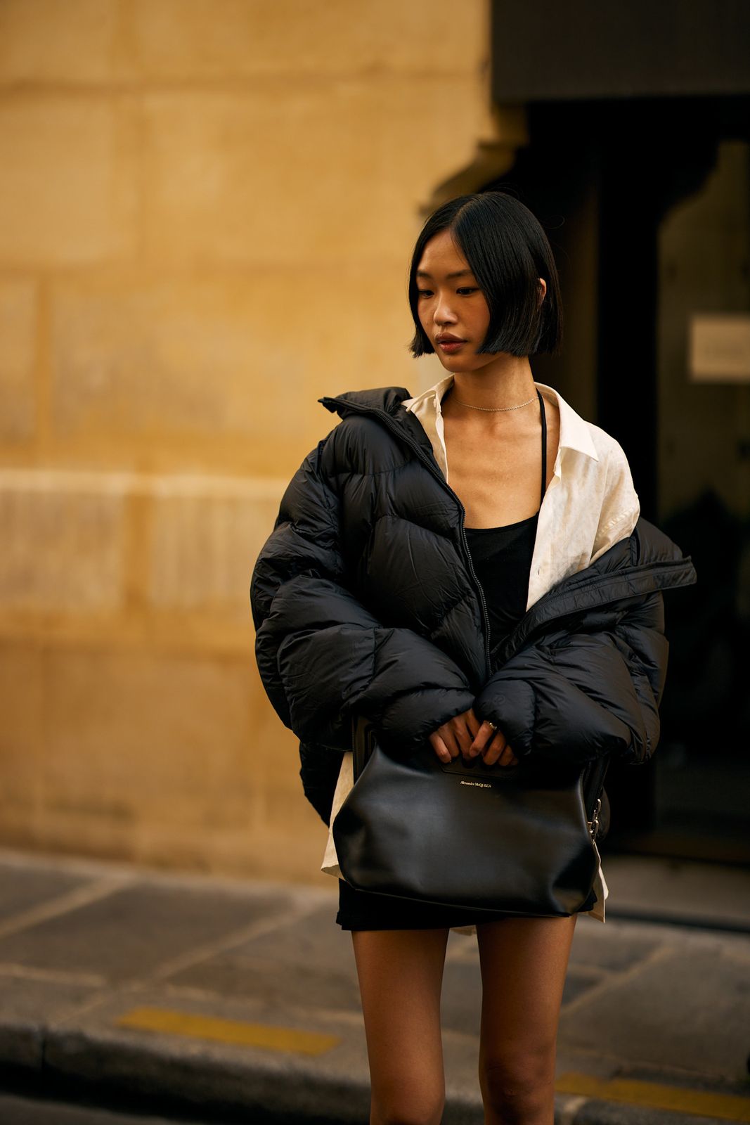 Oversized Black Puffer Jacket Layered Look — Puffer Bag Outfits 2027
