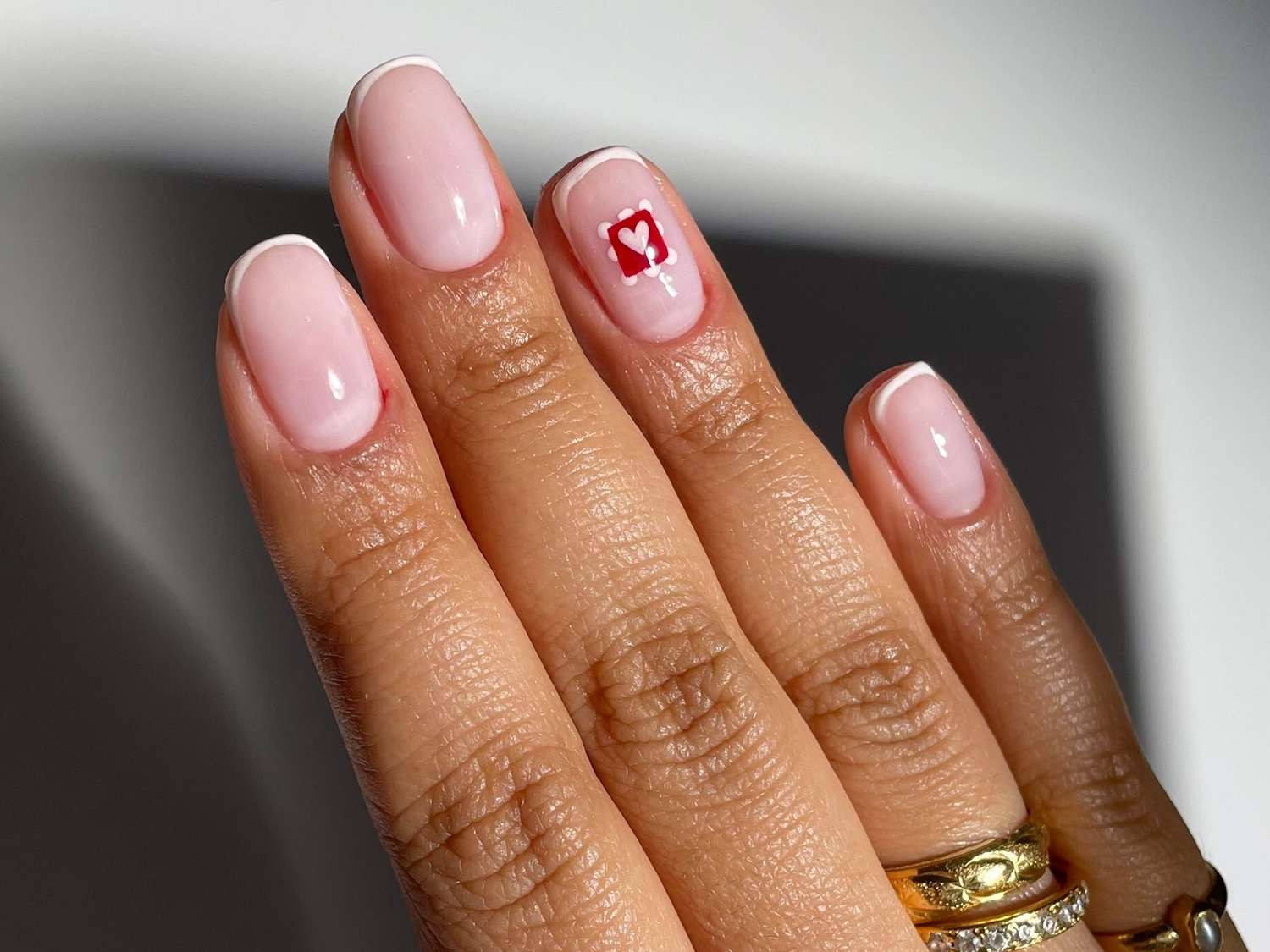 White French Tips with Red Heart Accent White French Tips with Red Heart Accent — Short Pink French Tip Nails 2027