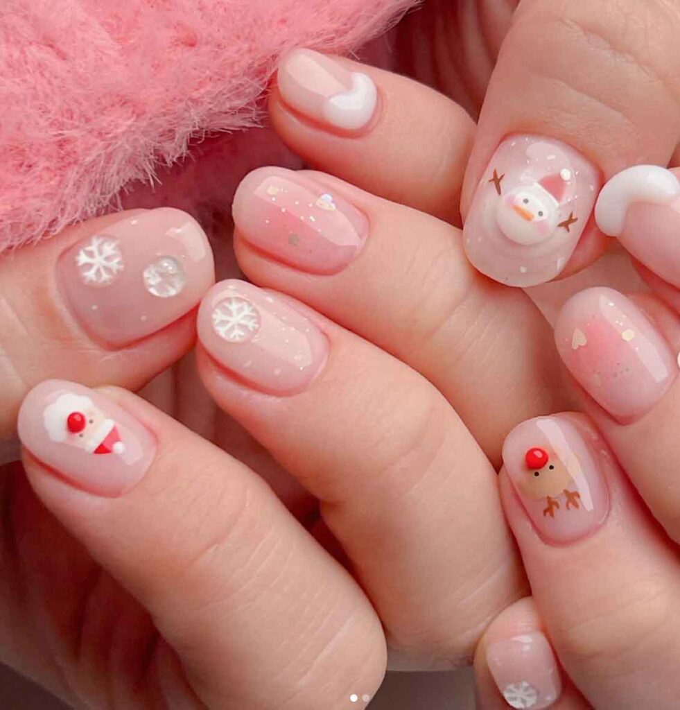 Pale Pink with Playful Christmas Decals — Short Christmas Nails 2026