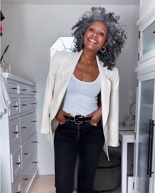 Cream Blazer Draped Over White Tank Top and Black Jeans Cream Blazer Draped Over White Tank Top and Black Jeans — Date Night Outfits 2027 for Women Over 50
