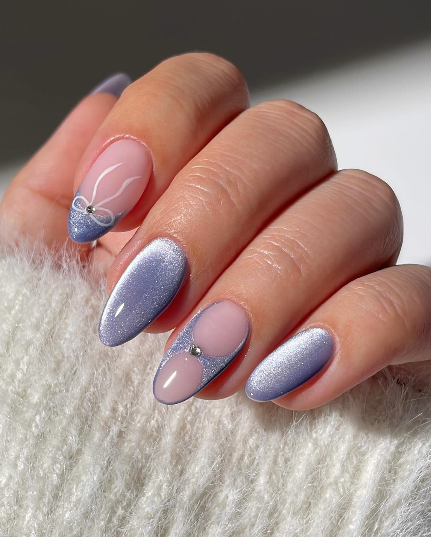 Light Blue Cat-Eye with Festive Accents — Winter Oval Nails 2027