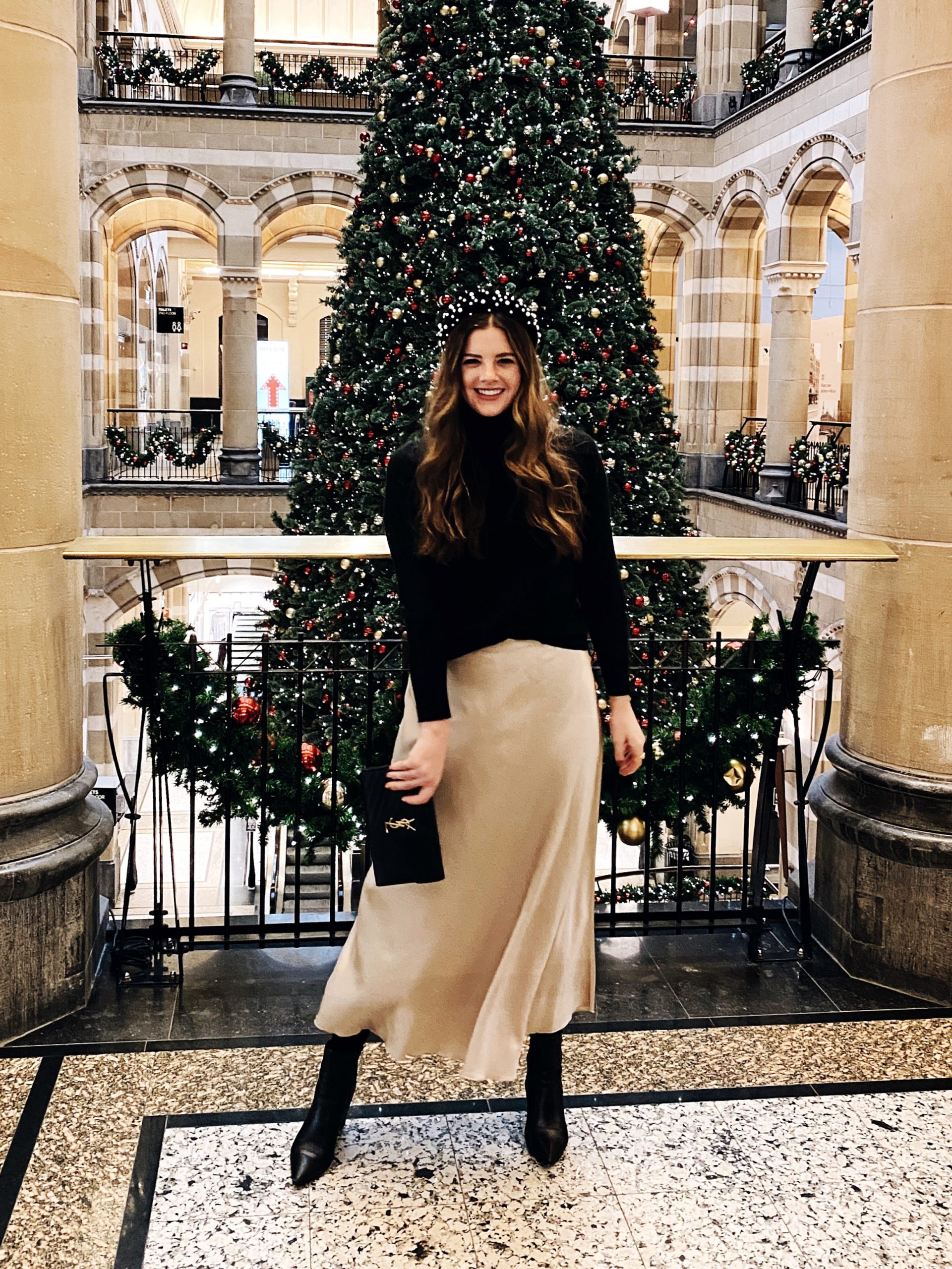 Black Turtleneck and Beige Satin Midi Skirt for a Chic Holiday Party Black Turtleneck and Beige Satin Midi Skirt for a Chic Holiday Party — Holiday Outfits 2026