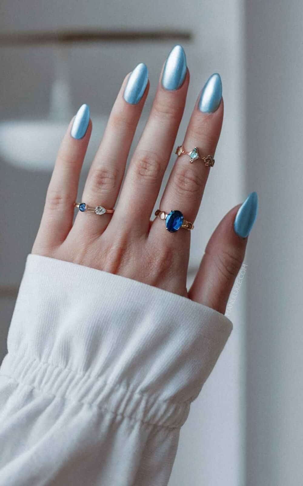 Glossy Sheer Base with Abstract Light Blue French Tips Glossy Sheer Base with Abstract Light Blue French Tips — Light Blue Quinceanera Nails 2027