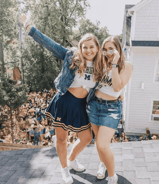 Modern Prep: Crop Top, Pleated Skirt, and Denim Jacket — College Game Day Outfits 2026