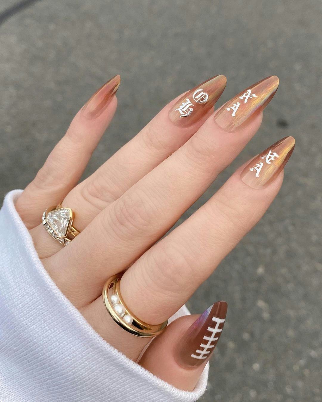 Warm Brown Cat-Eye Football Stilettos Warm Brown Cat-Eye Football Stilettos — Football Nails 2026