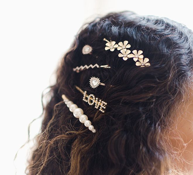 Mixed Barrettes on Dark Brown Curls — Barrette Hairstyles 2027