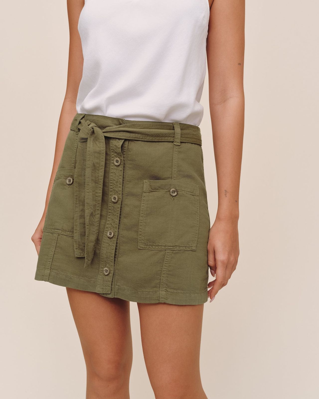 Olive Green Utility Mini Skirt with Tie Waist and White Tank Olive Green Utility Mini Skirt with Tie Waist and White Tank — Olive Green Mini Skirt Outfits 2027