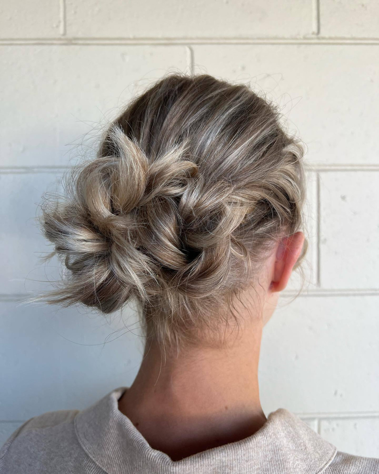 Textured Messy Bun With Braids Textured Messy Bun With Braids — Quick Gym Hairstyles 2027