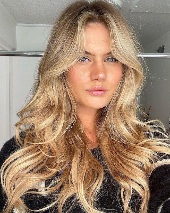 Voluminous Ash Blonde Blowout with Curtain Bangs Voluminous Ash Blonde Blowout with Curtain Bangs — Hairstyles 2027 for Fine Hair