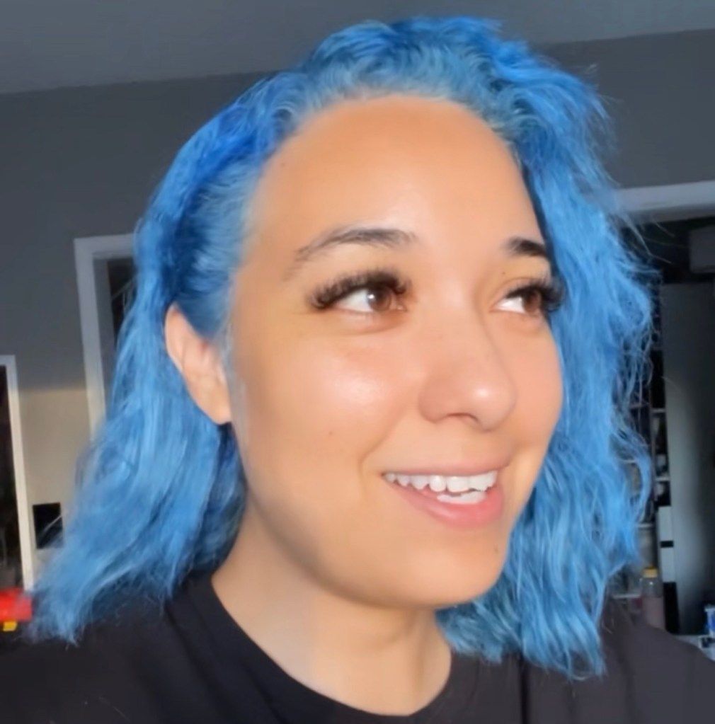 Vibrant Blue Layered Shag with Curtain Bangs Vibrant Blue Layered Shag with Curtain Bangs — Sky Blue Hair 2027