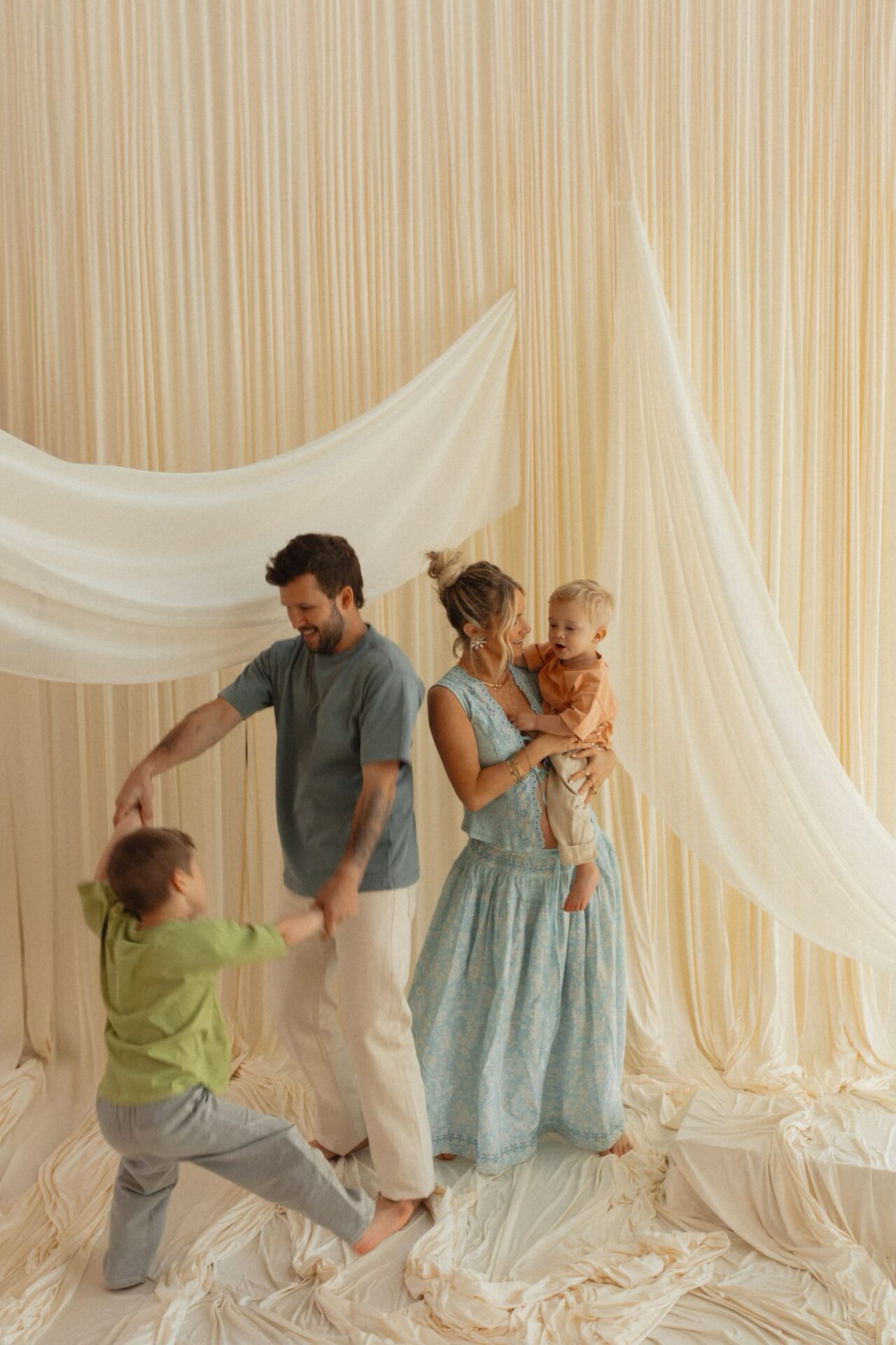 Casual Cool: Relaxed Trousers and a Patterned Maxi Dress Casual Cool: Relaxed Trousers and a Patterned Maxi Dress — Spring Family Photo Outfits 2027