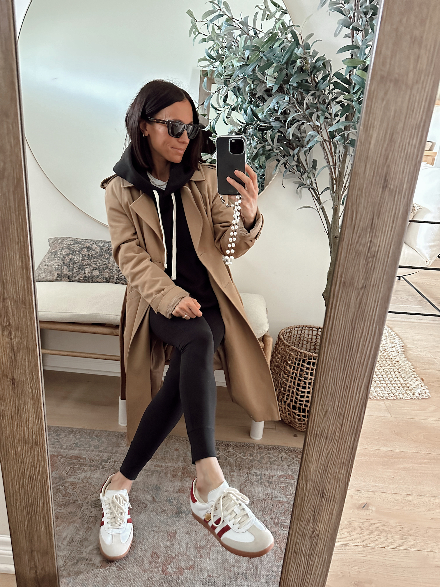 Beige Trench Coat over Hoodie with Black Leggings and Adidas Samba Beige Trench Coat over Hoodie with Black Leggings and Adidas Samba — Adidas Samba Spring Outfits 2027