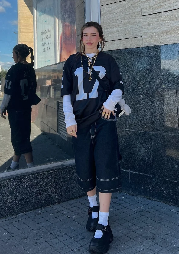 Sporty Layers: Football Jersey and Bermuda Shorts Sporty Layers: Football Jersey and Bermuda Shorts — Streetwear Outfits 2027